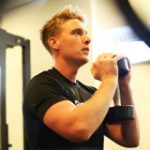 Professional pathway - man exercising with a weight