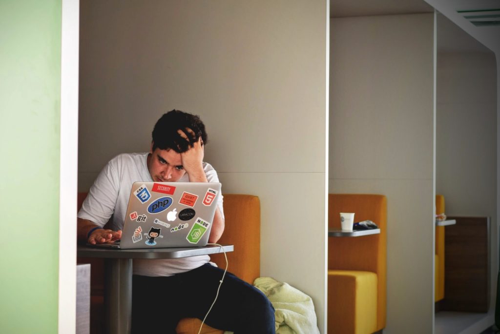 Man in front of laptop